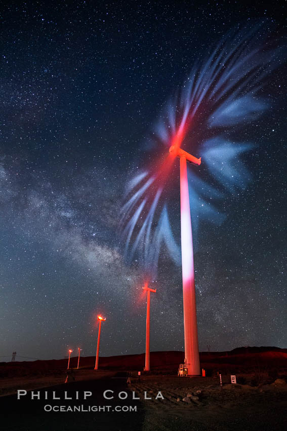 Ocotillo Wind Energy Turbines, at night with stars and the Milky Way in the sky above, the moving turbine blades illuminated by a small flashlight. California, USA, natural history stock photograph, photo id 30239