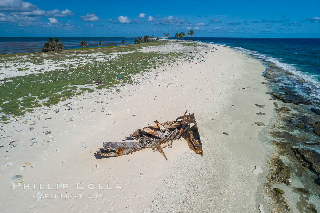 Old shipwreck debris on Clipperton Island aerial photo. Clipperton Island, a minor territory of France also known as Ile de la Passion, is a spectacular coral atoll in the eastern Pacific. By permit HC / 1485 / CAB (France)., natural history stock photograph, photo id 32881