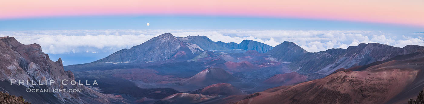 Panorama of Full Moon and Earth Shadow over Haleakala, Maui, Hawaii.  The dark band on the horizon is the shadow of the earth, while the lighter pink band is atmosphere that is still lit by the setting sun