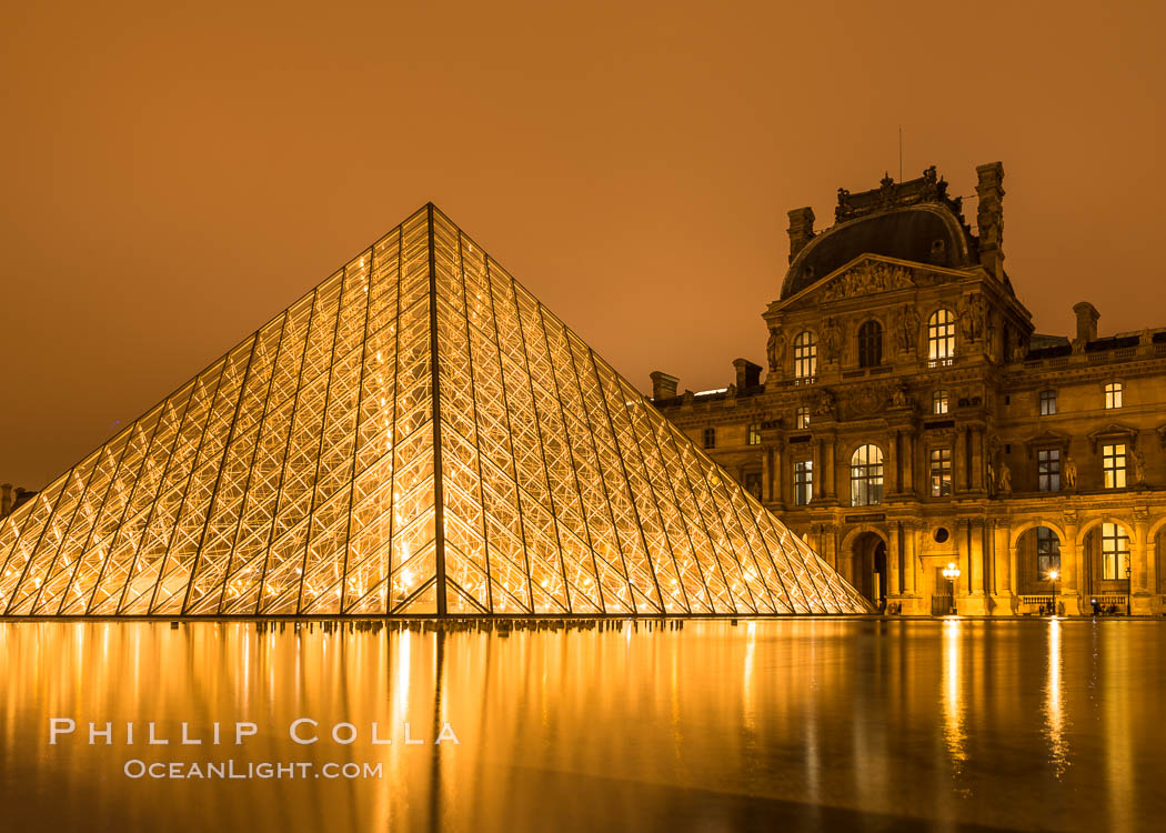 The Louvre Pyramid at Night, Pyramide du Louvre,  large glass and metal pyramid in the main courtyard (Cour Napoleon) of the Louvre Palace (Palais du Louvre) in Paris. Musee du Louvre, France, natural history stock photograph, photo id 28095