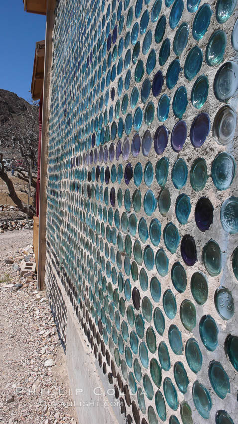 The strange "bottle house" of Rhyolite ghost town, near Death Valley. It was built in 1906 by Tom Kelley of approximately 50,000 beer bottles and was his home for a while. Nevada, USA, natural history stock photograph, photo id 20590