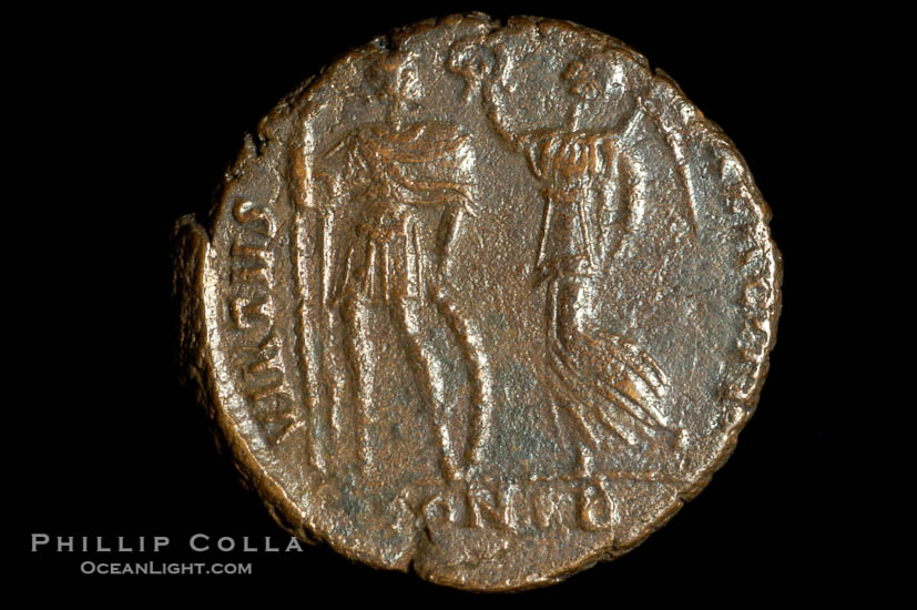 Roman emperor Arcadius (383-408 A.D.), depicted on ancient Roman coin (bronze, denom/type: AE3) (AE 16mm; Sear 4233. Obverse: DN ARCADIVS PF AVG. Reverse: VIRTVS EXERCITI, CONSB exergue.)., natural history stock photograph, photo id 06737