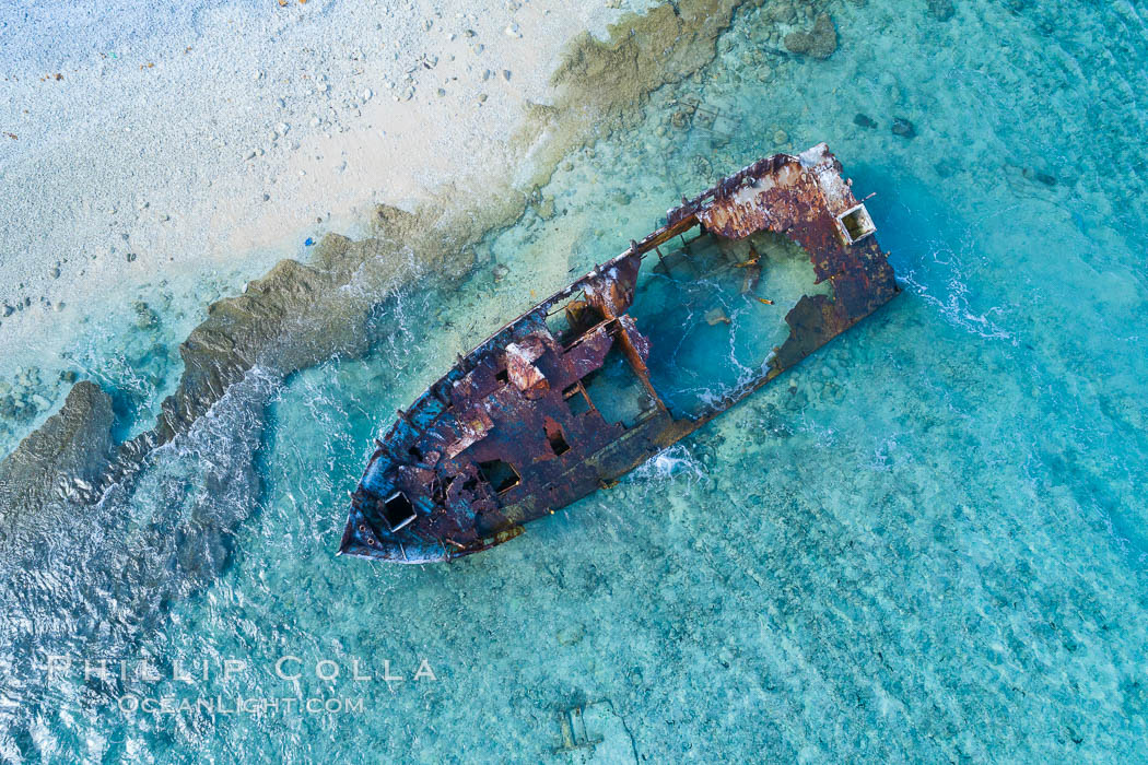 Rusting shipwreck on the beach at Clipperton Island, aerial photo, Clipperton Island is a spectacular coral atoll in the eastern Pacific. By permit HC / 1485 / CAB (France)., natural history stock photograph, photo id 32839