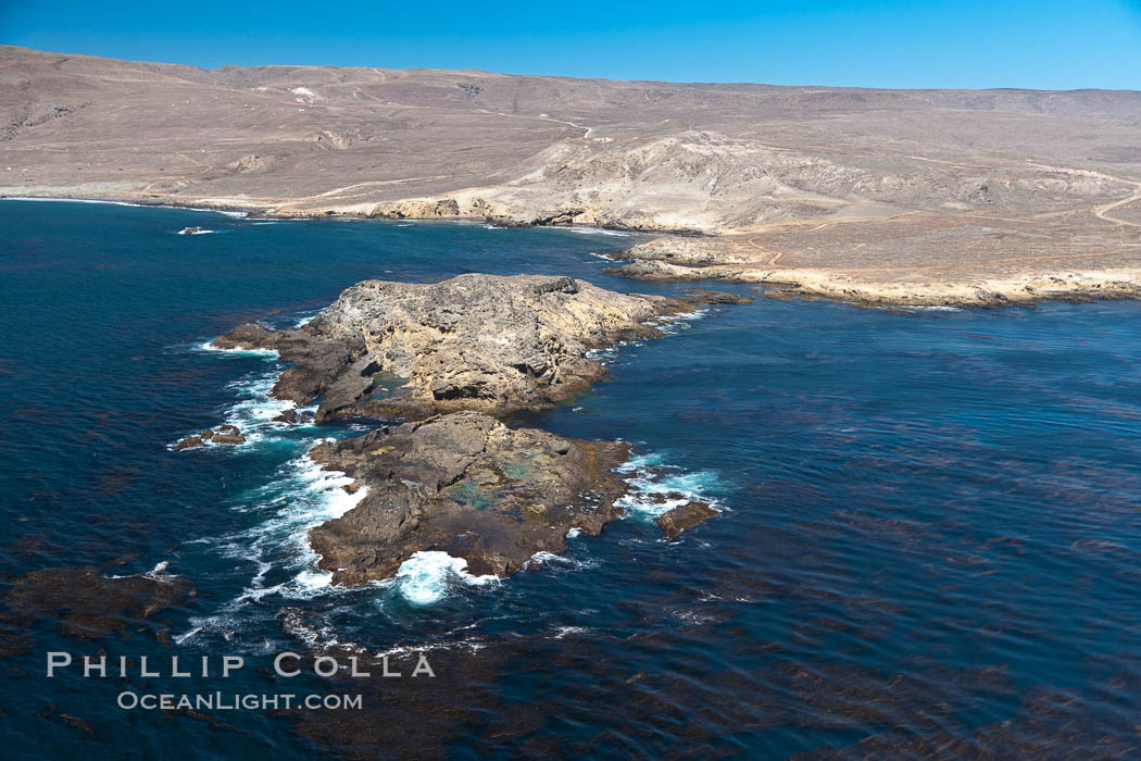 San Clemente Island, rugged barren coastline and island terrain surrounded by lush underwater kelp forests and marine life. California, USA, natural history stock photograph, photo id 26013