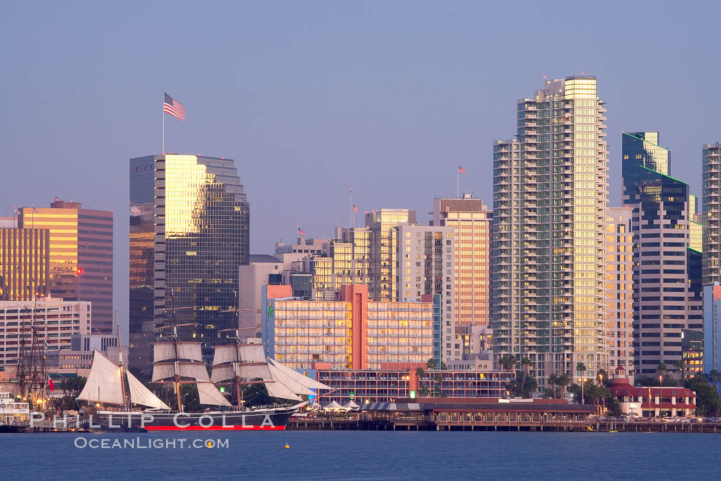 San Diego city skyline at dusk, viewed from Harbor Island, the Star of India at left. California, USA, natural history stock photograph, photo id 14538