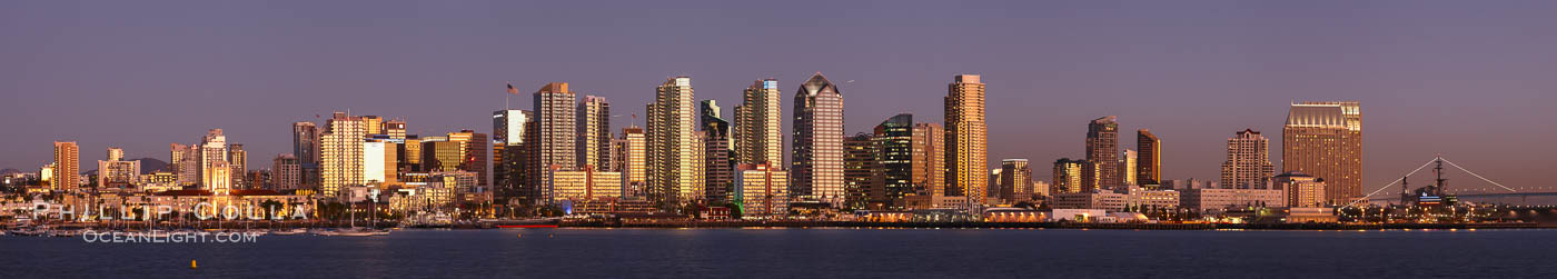San Diego city skyline at sunset, showing the buildings of downtown San Diego rising above San Diego Harbor, viewed from Harbor Island.  A panoramic photograph, composite of six separate images. California, USA, natural history stock photograph, photo id 22265