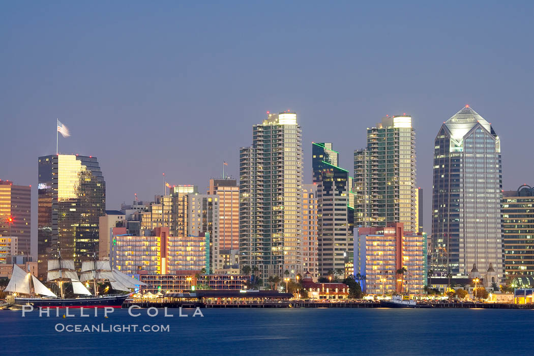 San Diego city skyline at dusk, viewed from Harbor Island, the Star of India at left. California, USA, natural history stock photograph, photo id 14527