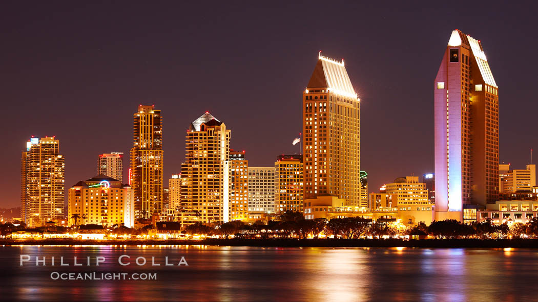 San Diego city skyline at night, showing the buildings of downtown San Diego reflected in the still waters of San Diego Harbor, viewed from Coronado Island. California, USA, natural history stock photograph, photo id 22250