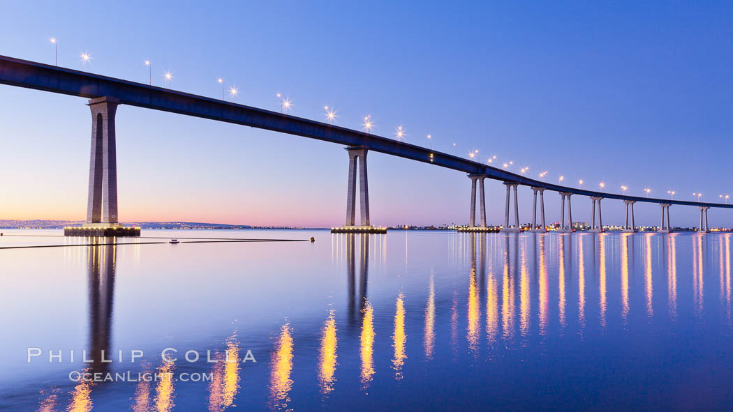 San Diego Coronado Bridge, linking San Diego to the island community of Coronado, spans San Diego Bay. Dawn, lavender sky