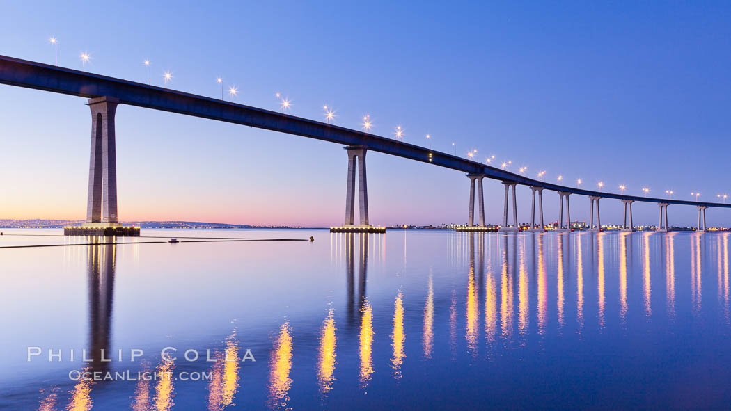 San Diego Coronado Bridge, linking San Diego to the island community of Coronado, spans San Diego Bay.  Dawn, lavender sky. California, USA, natural history stock photograph, photo id 27703