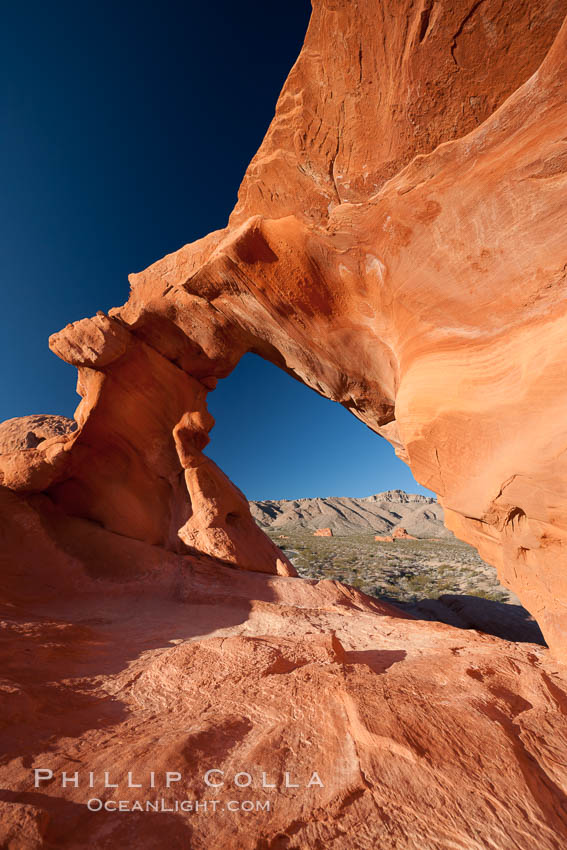Natural arch formed in sandstone. Valley of Fire State Park, Nevada, USA, natural history stock photograph, photo id 26501