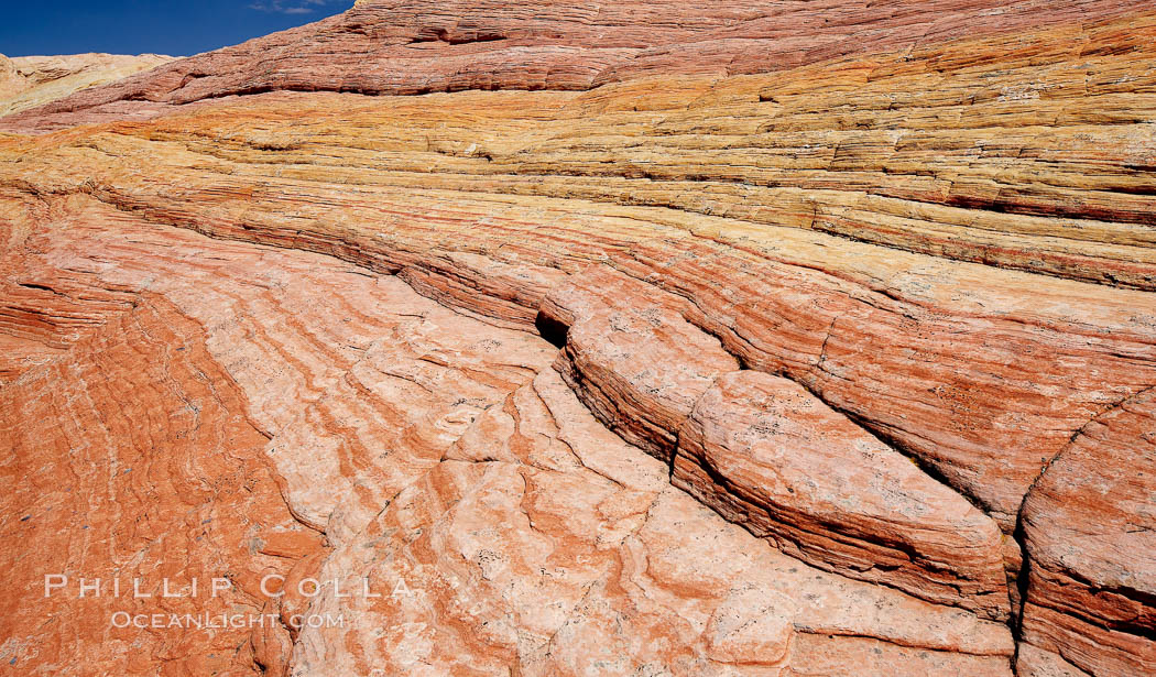 Striations in sandstone tell of eons of sedimentary deposits, a visible geologic record of the time when this region was under the sea. North Coyote Buttes, Paria Canyon-Vermilion Cliffs Wilderness, Arizona, USA, natural history stock photograph, photo id 20665