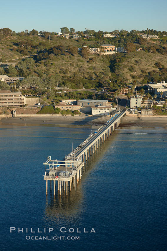 SIO Pier. The Scripps Institution of Oceanography research pier is 1090 feet long and was built of reinforced concrete in 1988, replacing the original wooden pier built in 1915. The Scripps Pier is home to a variety of sensing equipment above and below water that collects various oceanographic data. The Scripps research diving facility is located at the foot of the pier. Fresh seawater is pumped from the pier to the many tanks and facilities of SIO, including the Birch Aquarium. The Scripps Pier is named in honor of Ellen Browning Scripps, the most significant donor and benefactor of the Institution, La Jolla, California
