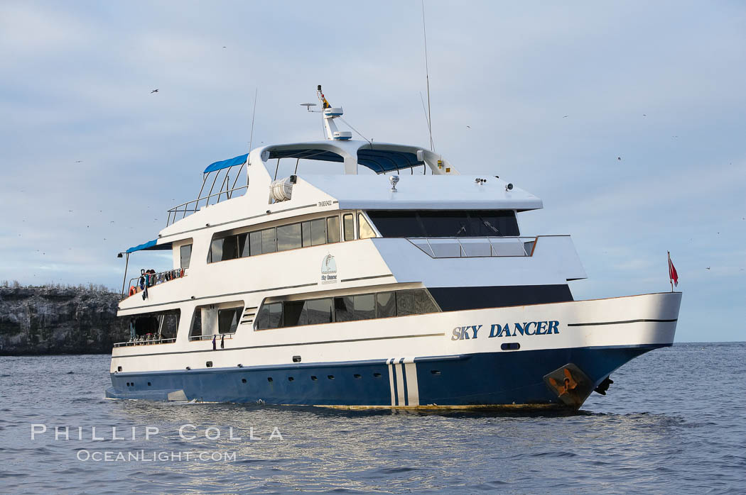 Sky Dancer, a liveaboard dive tour boat, at anchor. Wolf Island, Galapagos Islands, Ecuador, natural history stock photograph, photo id 16694