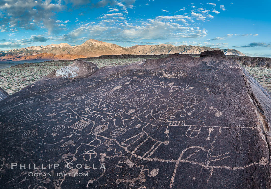 Sky Rock petroglyphs near Bishop, California.  Hidden atop on of the enormous boulders of the Volcanic Tablelands lies Sky Rock, a set of petroglyphs that face the sky.  These superb examples of native American petroglyph artwork are thought to be Paiute in origin, but little is known about them. USA, natural history stock photograph, photo id 26970
