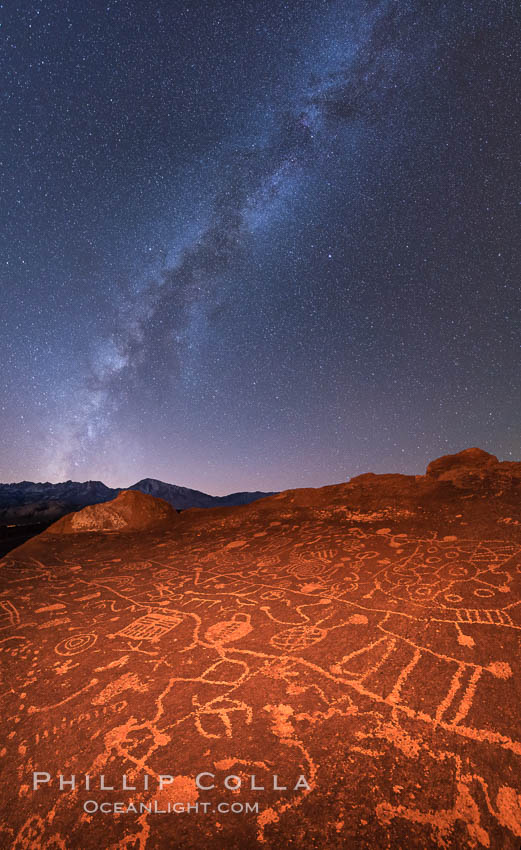 The Milky Way at Night over Sky Rock.  Sky Rock petroglyphs near Bishop, California. Hidden atop an enormous boulder in the Volcanic Tablelands lies Sky Rock, a set of petroglyphs that face the sky. These superb examples of native American petroglyph artwork are thought to be Paiute in origin, but little is known about them. USA, natural history stock photograph, photo id 28808