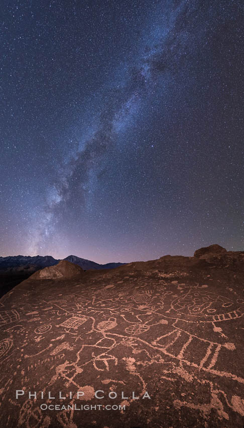 The Milky Way at Night over Sky Rock.  Sky Rock petroglyphs near Bishop, California. Hidden atop an enormous boulder in the Volcanic Tablelands lies Sky Rock, a set of petroglyphs that face the sky. These superb examples of native American petroglyph artwork are thought to be Paiute in origin, but little is known about them. USA, natural history stock photograph, photo id 28807