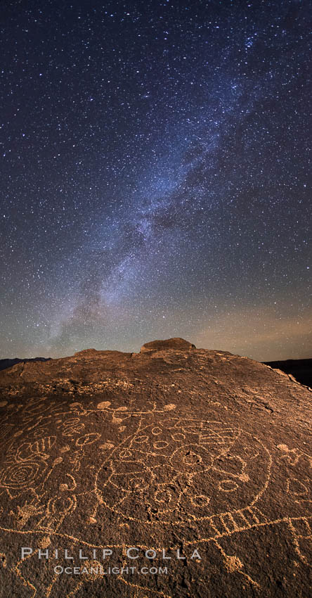 The Milky Way at Night over Sky Rock.  Sky Rock petroglyphs near Bishop, California. Hidden atop an enormous boulder in the Volcanic Tablelands lies Sky Rock, a set of petroglyphs that face the sky. These superb examples of native American petroglyph artwork are thought to be Paiute in origin, but little is known about them. USA, natural history stock photograph, photo id 28797