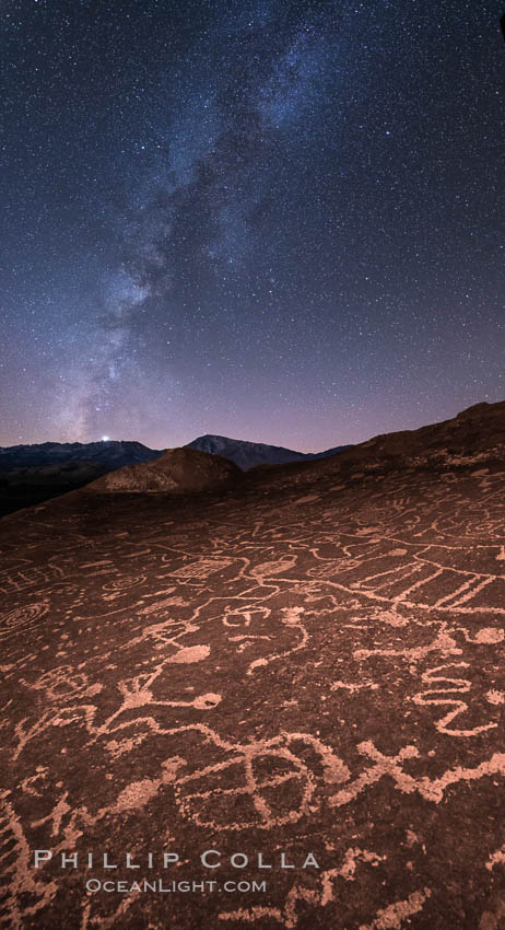 The Milky Way at Night over Sky Rock.  Sky Rock petroglyphs near Bishop, California. Hidden atop an enormous boulder in the Volcanic Tablelands lies Sky Rock, a set of petroglyphs that face the sky. These superb examples of native American petroglyph artwork are thought to be Paiute in origin, but little is known about them. USA, natural history stock photograph, photo id 28805