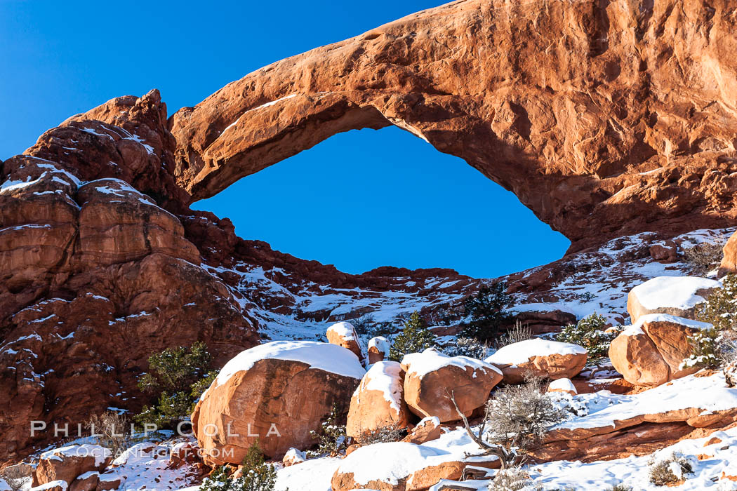 South Window, eastern face, sunrise, winter. Arches National Park, Utah, USA, natural history stock photograph, photo id 18151