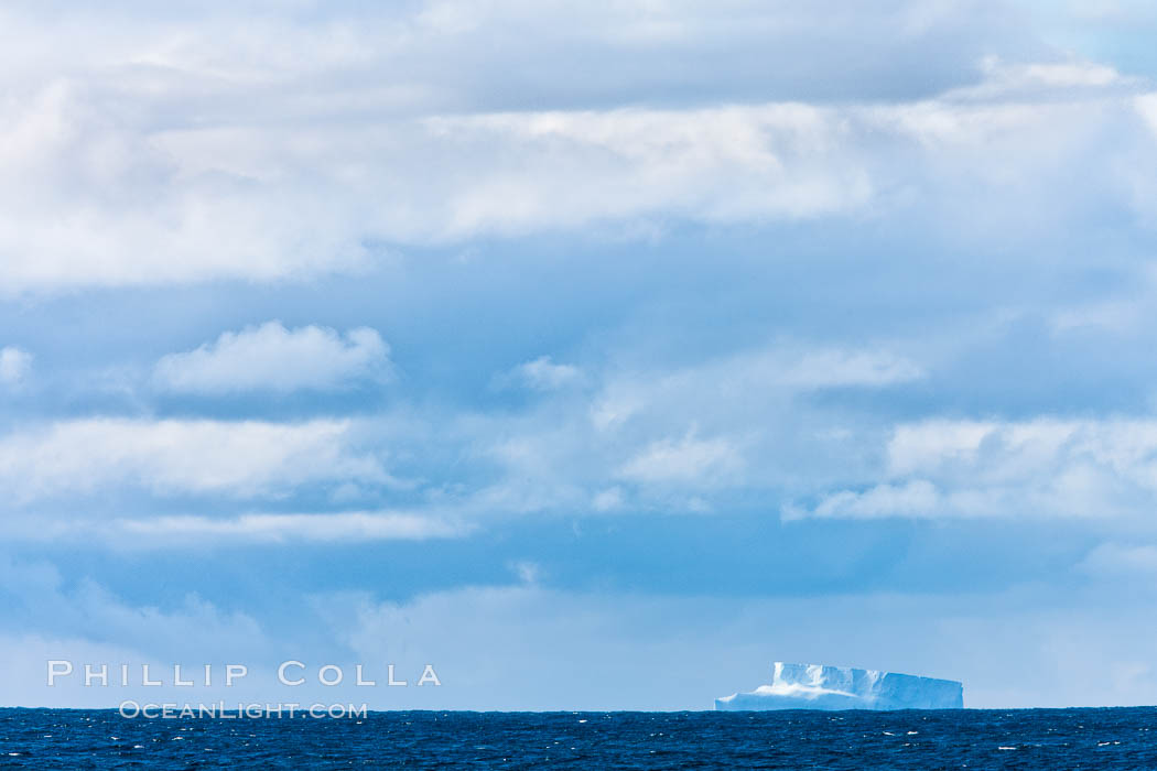 Clouds, weather and light mix in neverending forms over the open ocean of Scotia Sea, in the Southern Ocean