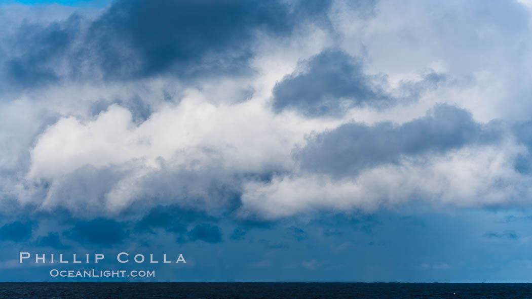 Clouds, weather and light mix in neverending forms over the open ocean of Scotia Sea, in the Southern Ocean., natural history stock photograph, photo id 24760