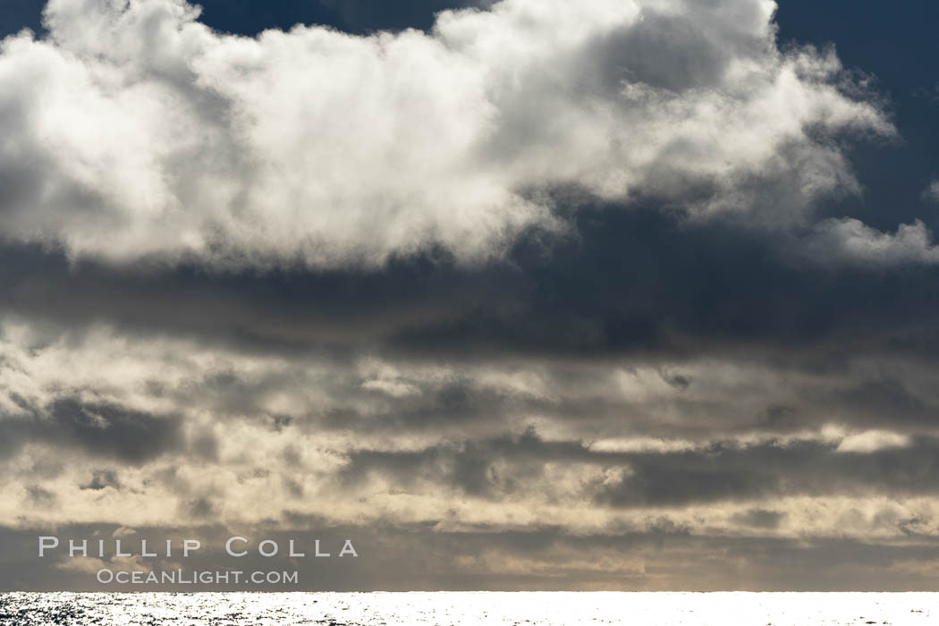 Clouds, weather and light mix in neverending forms over the open ocean of Scotia Sea, in the Southern Ocean., natural history stock photograph, photo id 24773