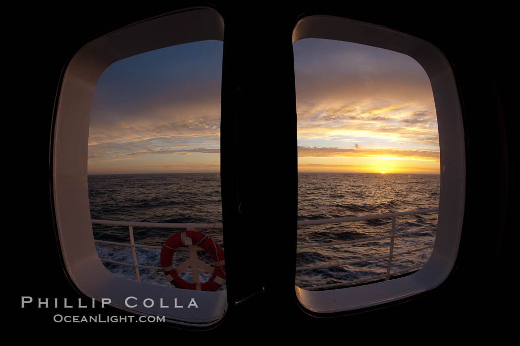 Sunset viewed through the window of my cabin on the M/V Polar Star, somewhere between Falkland Islands and South Georgia Island