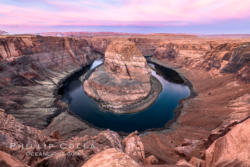 Spectacular Horseshoe Bend sunrise. The Colorado River makes a 180-degree turn at Horseshoe Bend. Here the river has eroded the Navajo sandstone for eons, digging a canyon 1100-feet deep. Page, Arizona, USA, natural history stock photograph, photo id 35939