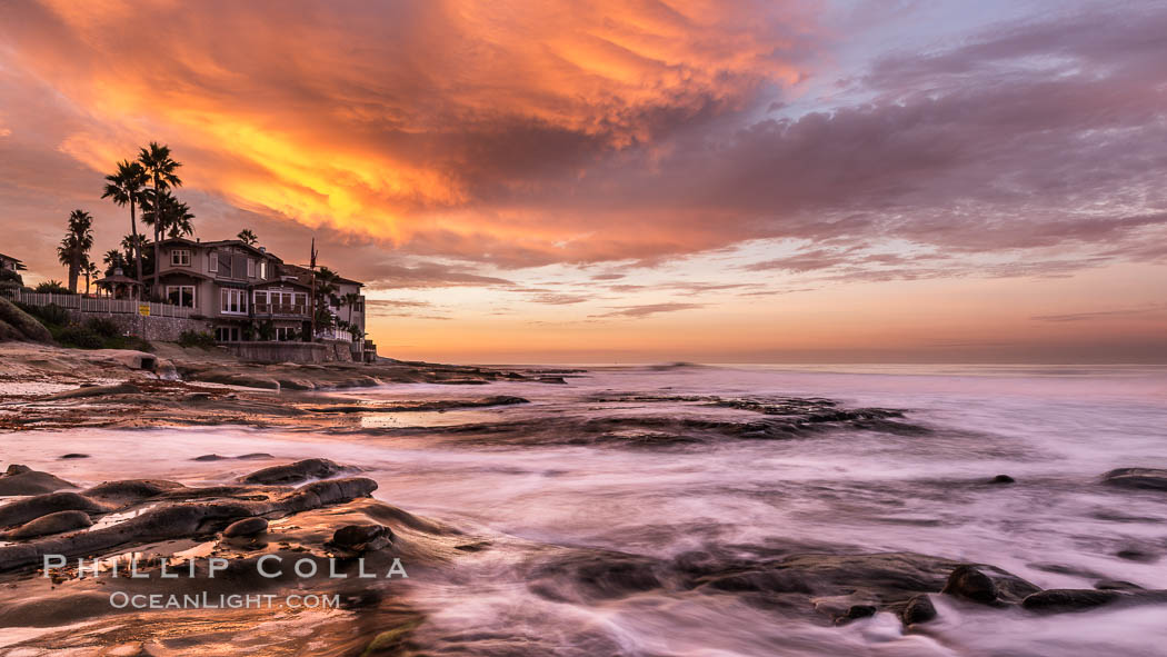 A fiery sunrise explodes over the La Jolla coastline. California, USA, natural history stock photograph, photo id 28872