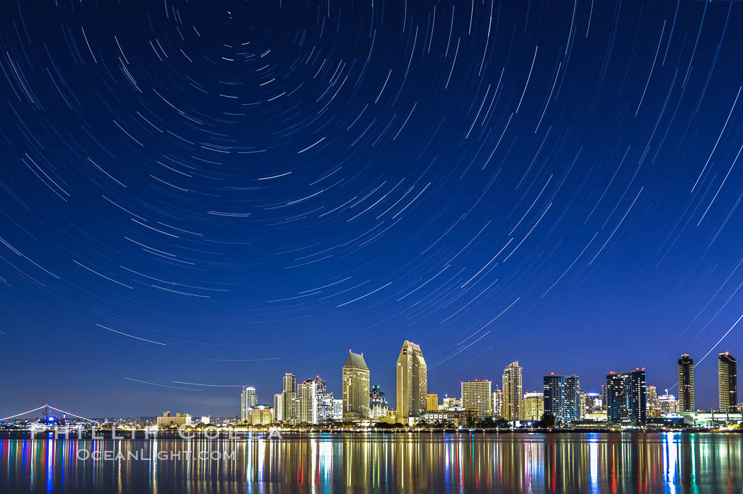 Star Trails over the San Diego Downtown City Skyline.  In this 60 minute exposure, stars create trails through the night sky over downtown San Diego. California, USA, natural history stock photograph, photo id 28383