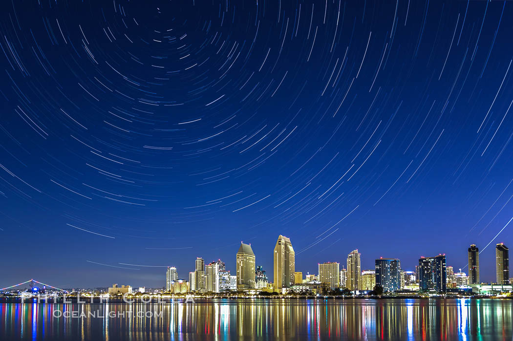 Star Trails over the San Diego Downtown City Skyline. In this 60 minute exposure, stars create trails through the night sky over downtown San Diego