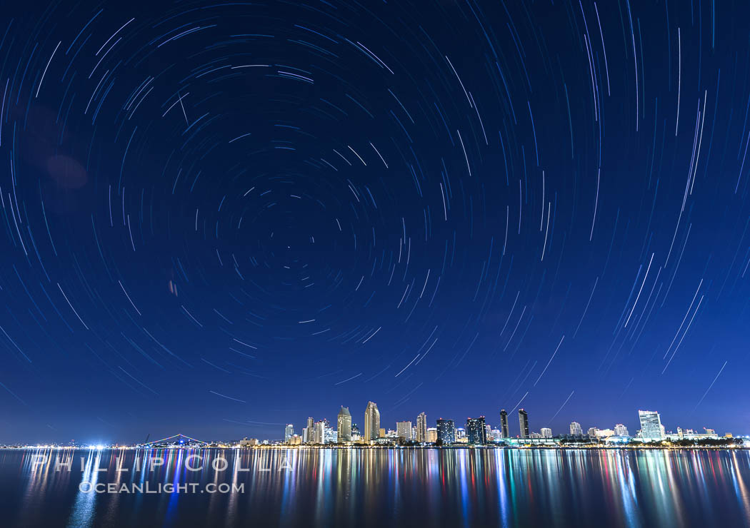 Star Trails over the San Diego Downtown City Skyline.  In this 60 minute exposure, stars create trails through the night sky over downtown San Diego. California, USA, natural history stock photograph, photo id 28385