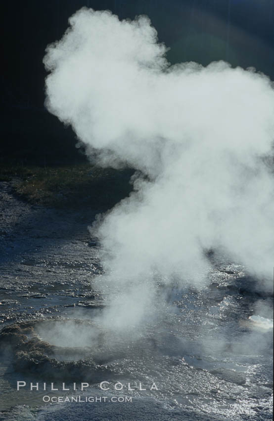Steam rises a geyser on Geyser Hill. Upper Geyser Basin, Yellowstone National Park, Wyoming, USA, natural history stock photograph, photo id 07257