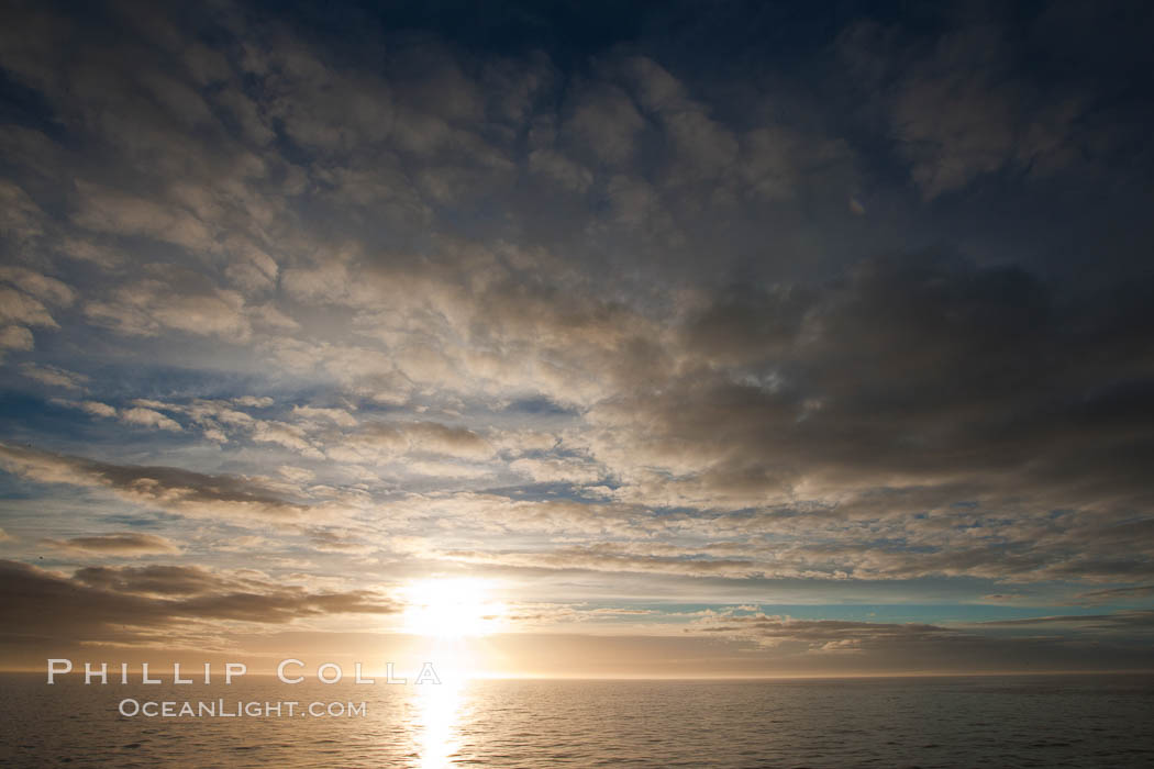 Sunrise, somewhere along the Antarctic Peninsula. Antarctica, natural history stock photograph, photo id 24798