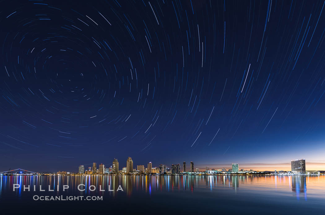 Approaching sunrise and star trails over the San Diego Downtown City Skyline.  In this 60 minute exposure, stars create trails through the night sky over downtown San Diego. California, USA, natural history stock photograph, photo id 28388
