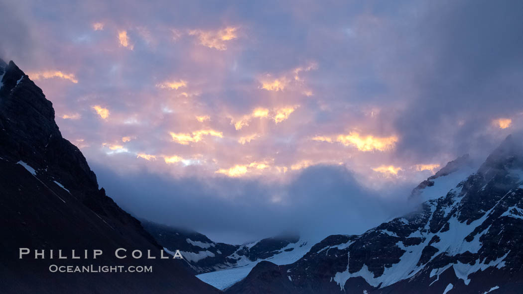 Sunset clouds above South Georgia Island. Right Whale Bay, natural history stock photograph, photo id 24345