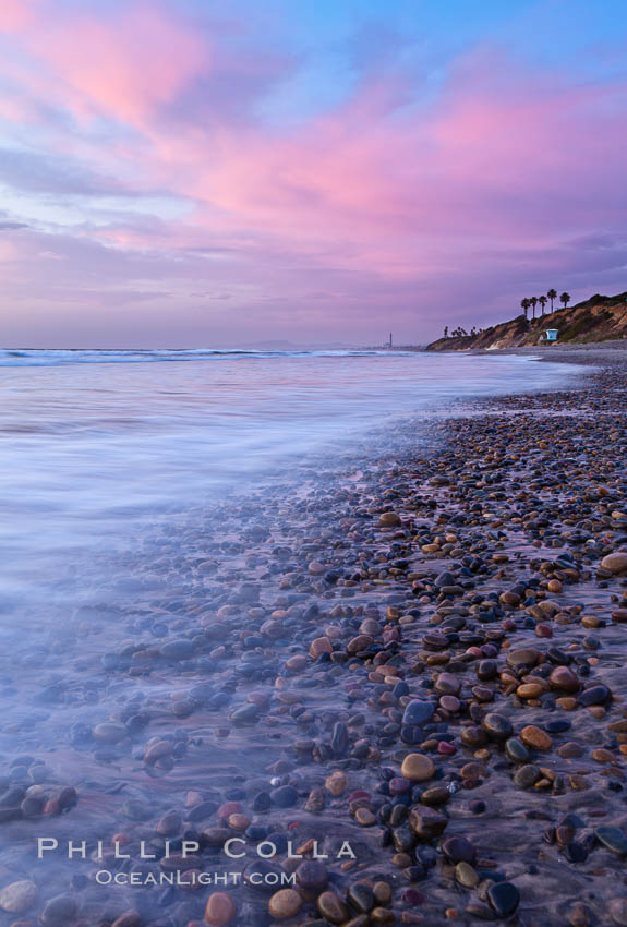 Sunset and incoming surf, gorgeous colors in the sky and on the ocean at dusk, the incoming waves are blurred in this long exposure. Carlsbad, California, USA, natural history stock photograph, photo id 27166