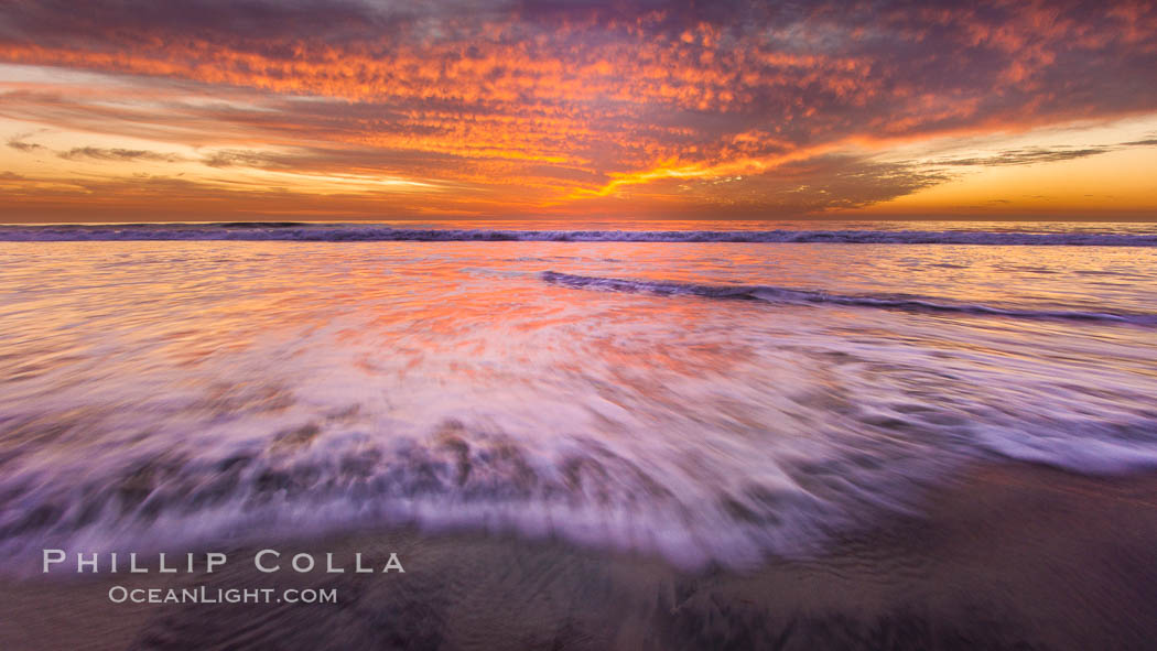 Sunset and incoming surf, gorgeous colors in the sky and on the ocean at dusk, the incoming waves are blurred in this long exposure. Carlsbad, California, USA, natural history stock photograph, photo id 27156