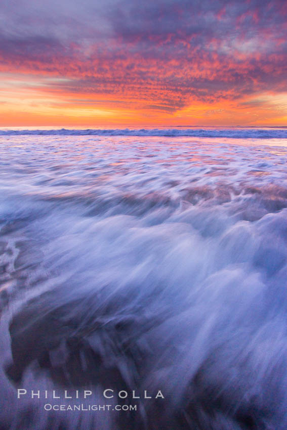 Sunset and incoming surf, gorgeous colors in the sky and on the ocean at dusk, the incoming waves are blurred in this long exposure. Carlsbad, California, USA, natural history stock photograph, photo id 27160