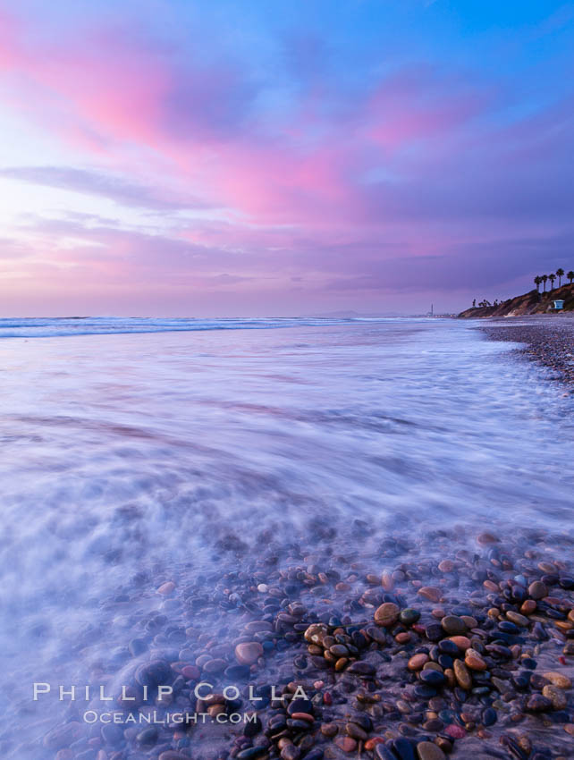 Sunset and incoming surf, gorgeous colors in the sky and on the ocean at dusk, the incoming waves are blurred in this long exposure. Carlsbad, California, USA, natural history stock photograph, photo id 27168