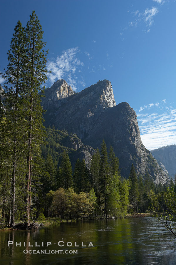 Three Brothers rises above the Merced River, Yosemite Valley., natural history stock photograph, photo id 16108