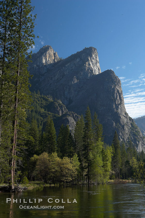 Three Brothers rises above the Merced River, Yosemite Valley., natural history stock photograph, photo id 16107