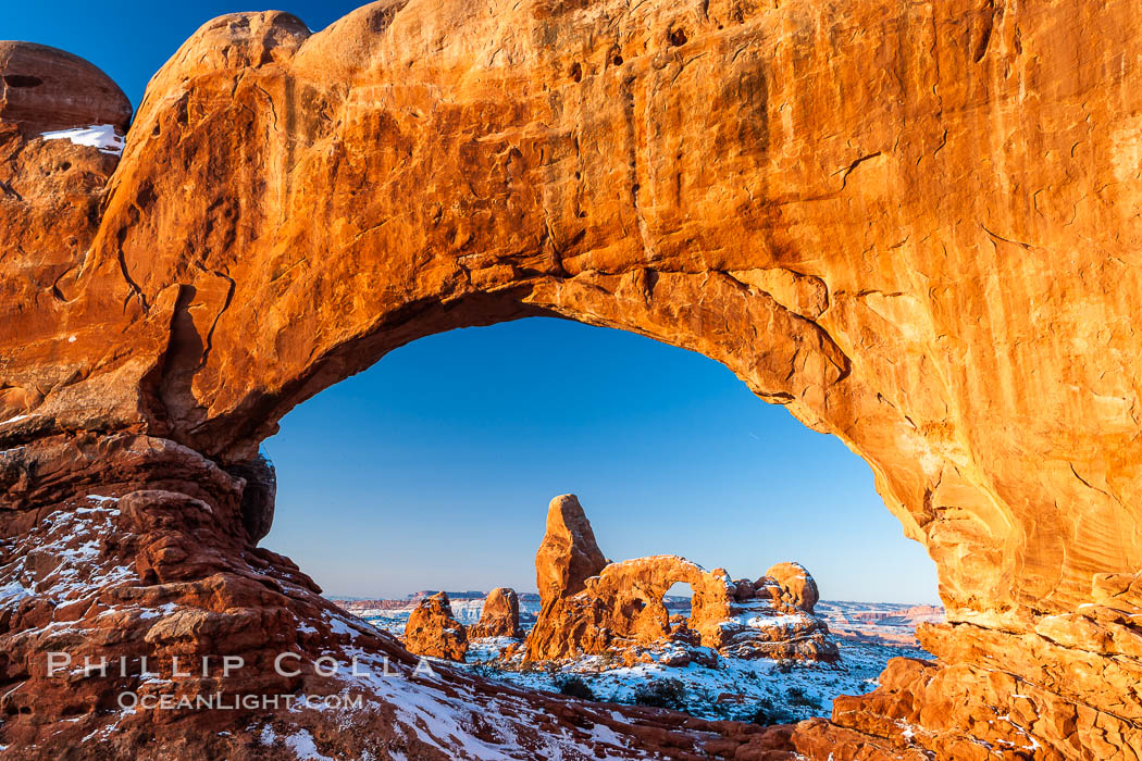 Turret Arch through North Window, winter, sunrise. Arches National Park, Utah, USA, natural history stock photograph, photo id 18120