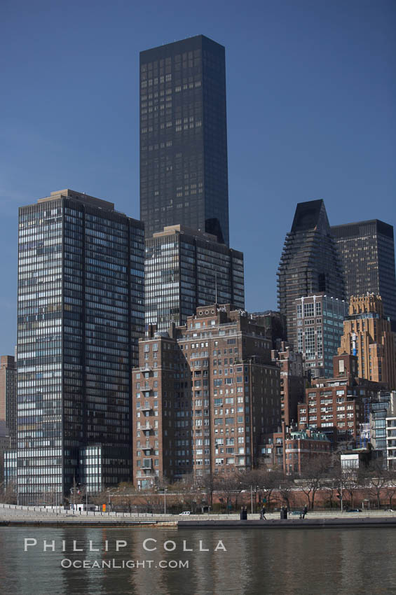 New York Citys Upper East Side, viewed from the East River.  The Trump World Tower rises in the background. Manhattan, USA, natural history stock photograph, photo id 11137