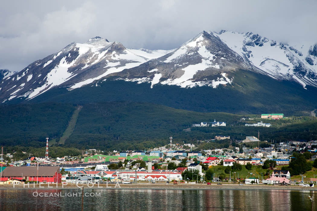 Ushuaia, the southernmost city in the world, lies on the Beagle Channel with a small portion of the Andes mountain range rising above.  Ushuaia is the capital of the Tierra del Fuego region of Argentina and the gateway port for many expeditions to Antarctica., natural history stock photograph, photo id 23602