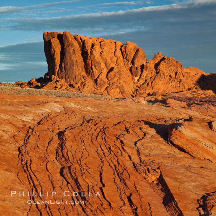 Sandstone striations and butte, dawn. Valley of Fire State Park, Nevada, USA, natural history stock photograph, photo id 26514