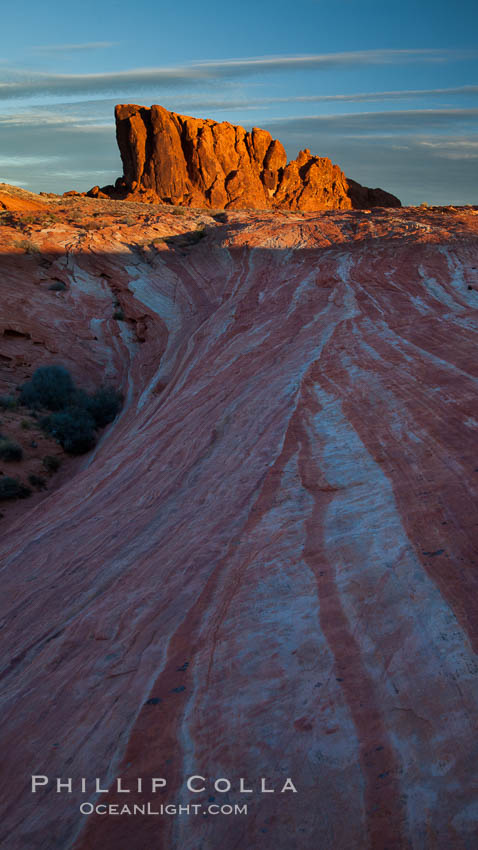 Sandstone striations and butte, dawn. Valley of Fire State Park, Nevada, USA, natural history stock photograph, photo id 26515