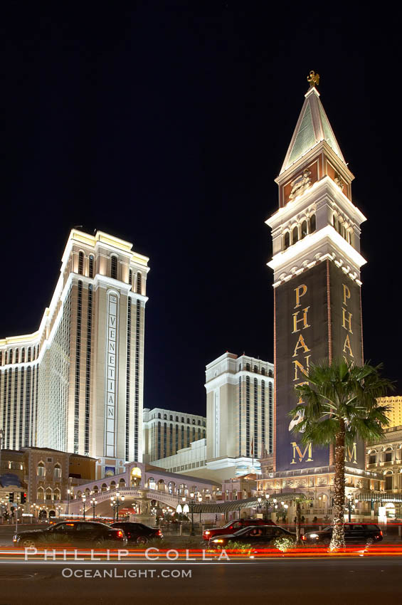The Venetian Hotel rises above the Strip, Las Vegas Boulevard, at night