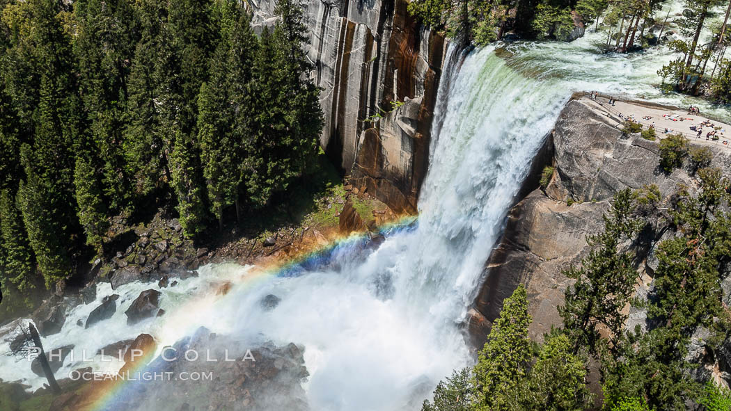 Vernal Falls at peak flow in late spring, hikers visible at precipice, viewed from John Muir Trail. Yosemite National Park, California, USA, natural history stock photograph, photo id 07772